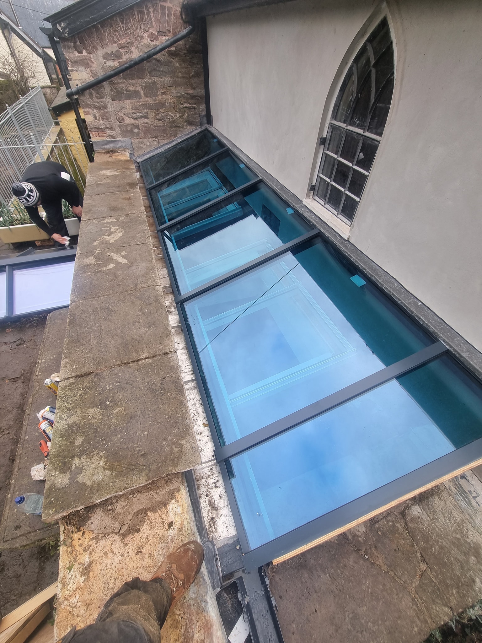 Newly fitted double glazing windows on side of building